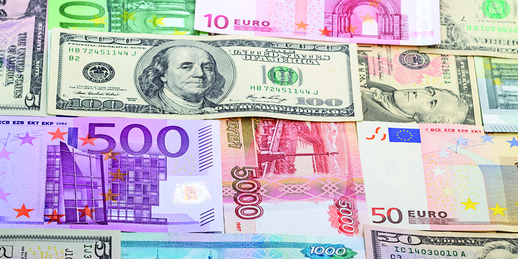 An image of multiple currencies beside one another.